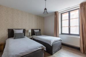 Postel nebo postele na pokoji v ubytování LA FERME D'ELISA + 29 fotografií