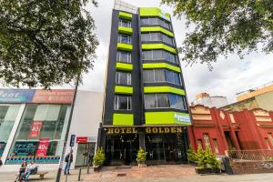 a hotel colonial building on a city street at Ayenda 1063 Golden in Bogot&aacute;