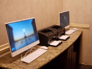 a desk with a computer and a printer on it at Best Western Plus Hawthorne Terrace Hotel in Chicago