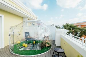 Patio nebo venkovní prostory v ubytování 禾旅宿Ho Hostel 墾丁夢幻島