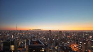 an aerial view of a city at sunset at Mandarin Oriental, Tokyo in Tokyo