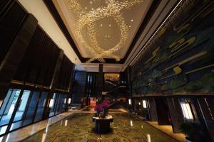 Зображення з фотогалереї помешкання Vignette Collection Haikou Yatter Hotel by IHG у місті Хайкоу
