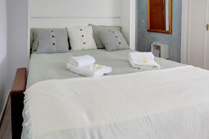 Posteľ alebo postele v izbe v ubytovaní Apartamento Murillo