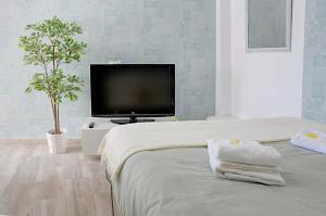 Posteľ alebo postele v izbe v ubytovaní Apartamento Murillo