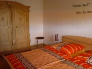 Ένα ή περισσότερα κρεβάτια σε δωμάτιο στο Ferienwohnung Mau