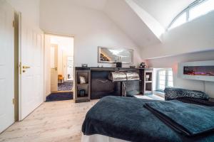 Kuchyň nebo kuchyňský kout v ubytování Hotel Suitess