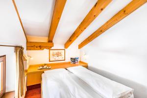 Voodi või voodid majutusasutuse Hotel Cristiania toas