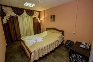 
Кровать или кровати в номере ФАБ Мини Отель
