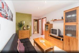 Telewizja i/lub zestaw kina domowego w obiekcie Apartamento Terraza soleada
