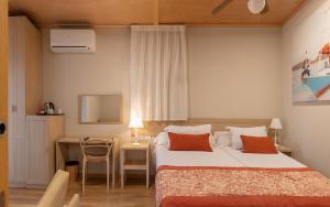 Łóżko lub łóżka w pokoju w obiekcie Magic Natura Resort