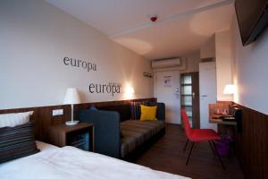 Postel nebo postele na pokoji v ubytování Hotel Europa Life