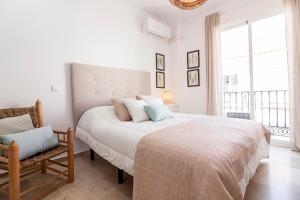 Posteľ alebo postele v izbe v ubytovaní Cervantes FreshApartments