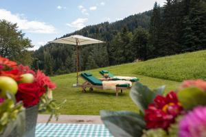 Vonkajšia záhrada v ubytovaní Chalet Berghaus Gauertal