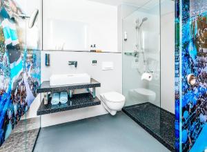 Koupelna v ubytování Hotel Schwertfirm