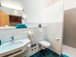 Koupelna v ubytování Hotel Schwertfirm