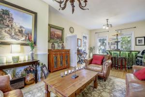 a living room with a couch and a coffee table at Broad Street Inn in Nevada City