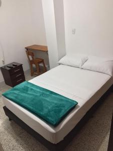 Cama o camas de una habitación en Roomies House By Rincon