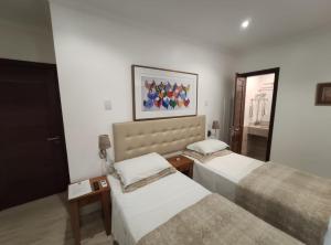 Llit o llits en una habitació de Pousada Bahia Pelô