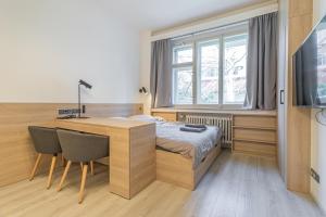 Televízia a/alebo spoločenská miestnosť v ubytovaní Business Studio Andel, 10 min to Centre, NETFLIX, Paid Parking