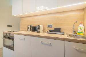 Kuchyň nebo kuchyňský kout v ubytování Business Studio Andel, 10min Centre, NETFLIX, Paid Parking
