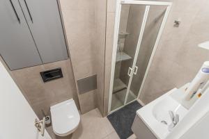 A bathroom at Business Studio Andel, 10min Centre, NETFLIX, Paid Parking