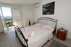 Postel nebo postele na pokoji v ubytování Holiday Home Miklica