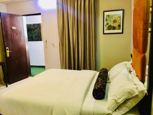 Ένα ή περισσότερα κρεβάτια σε δωμάτιο στο BW Starfire Hotel
