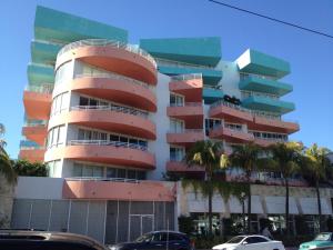 a building with balconies on the side of it at Dream Destinations at Ocean Place in Miami Beach