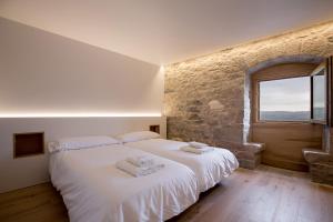Postel nebo postele na pokoji v ubytování Palacio de Olza