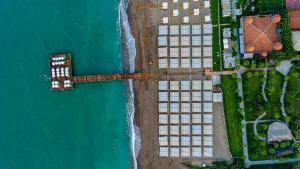 an overhead view of the beach and the ocean at Sherwood Exclusive Lara in Lara