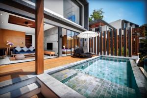 Bazén v ubytování Jamahkiri Dive Resort & Spa nebo v jeho okolí