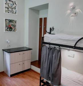 Postel nebo postele na pokoji v ubytování Capsularhouse Hostel