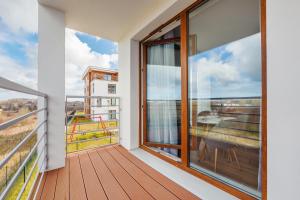 Balkón alebo terasa v ubytovaní Apartamenty Sun & Snow Residence II Jastrzębia Góra - plac zabaw, blisko plaży, wysoki standard