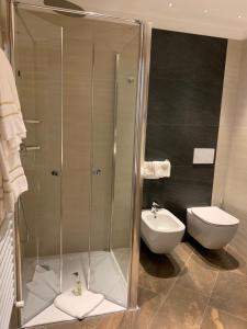 Koupelna v ubytování Hotel Alba