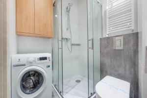 Kúpeľňa v ubytovaní Apartamenty Sun & Snow Residence II Jastrzębia Góra - plac zabaw, blisko plaży, wysoki standard
