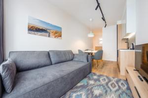Kuchyňa alebo kuchynka v ubytovaní Apartamenty Sun & Snow Residence II Jastrzębia Góra - plac zabaw, blisko plaży, wysoki standard