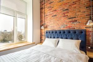 Postel nebo postele na pokoji v ubytování Secret Apartments