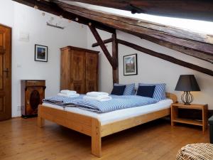 Posteľ alebo postele v izbe v ubytovaní Penzion Kamenne Slunce