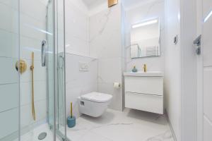 Koupelna v ubytování Apartamenty Sun & Snow Międzyzdroje Promenada