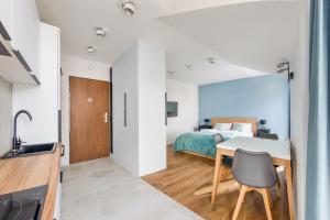 Postel nebo postele na pokoji v ubytování Apartamenty Sun & Snow Międzyzdroje Promenada