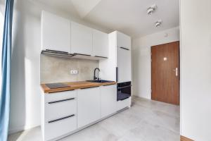 Kuchyň nebo kuchyňský kout v ubytování Apartamenty Sun & Snow Międzyzdroje Promenada