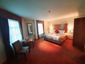 Krevet ili kreveti u jedinici u okviru objekta Westgrove Hotel