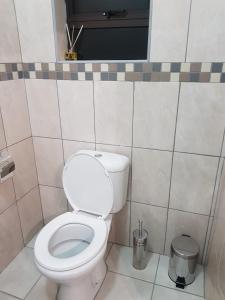 Koupelna v ubytování ONNIE GUESTHOUSE