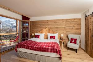 Кровать или кровати в номере Kitzhof Mountain Design Resort