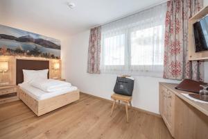 Postel nebo postele na pokoji v ubytování Hotel Theiner