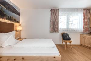 Postel nebo postele na pokoji v ubytování Hotel Theiner