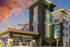 a rendering of the front of a hotel at La Quinta by Wyndham Denver Gateway Park in Denver