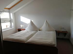 Postel nebo postele na pokoji v ubytování Haus Leifert