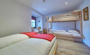 Posteľ alebo postele v izbe v ubytovaní Appartement zum Turm Top 4