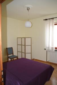 Posteľ alebo postele v izbe v ubytovaní B&B San Russorio